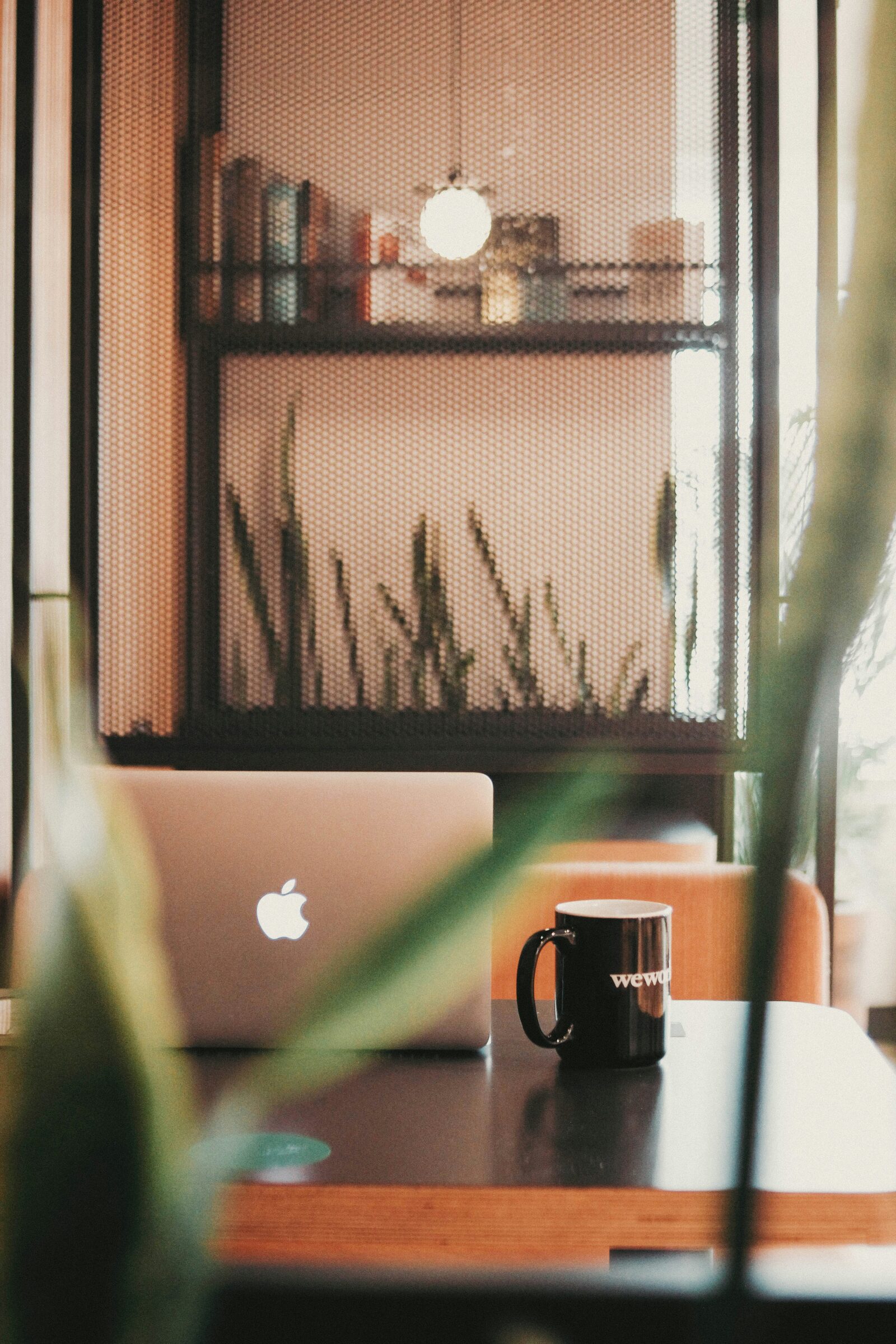 Laptop and notebook on a table