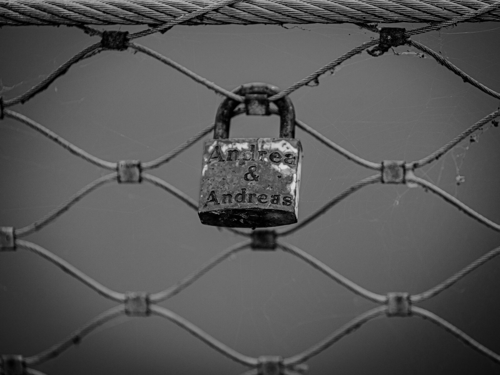 Padlock on a dark surface